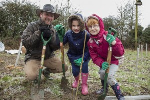 Children from Avonmouth in Bristol brave the cold for a 'One Tree Per Child' planting organised by Bristol council.